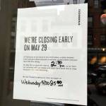A sign at a Starbucks cafe in Portland, Maine, reminds customers that the store will be closed Tuesday for training. (AP Photo/Scott Mayerowitz)