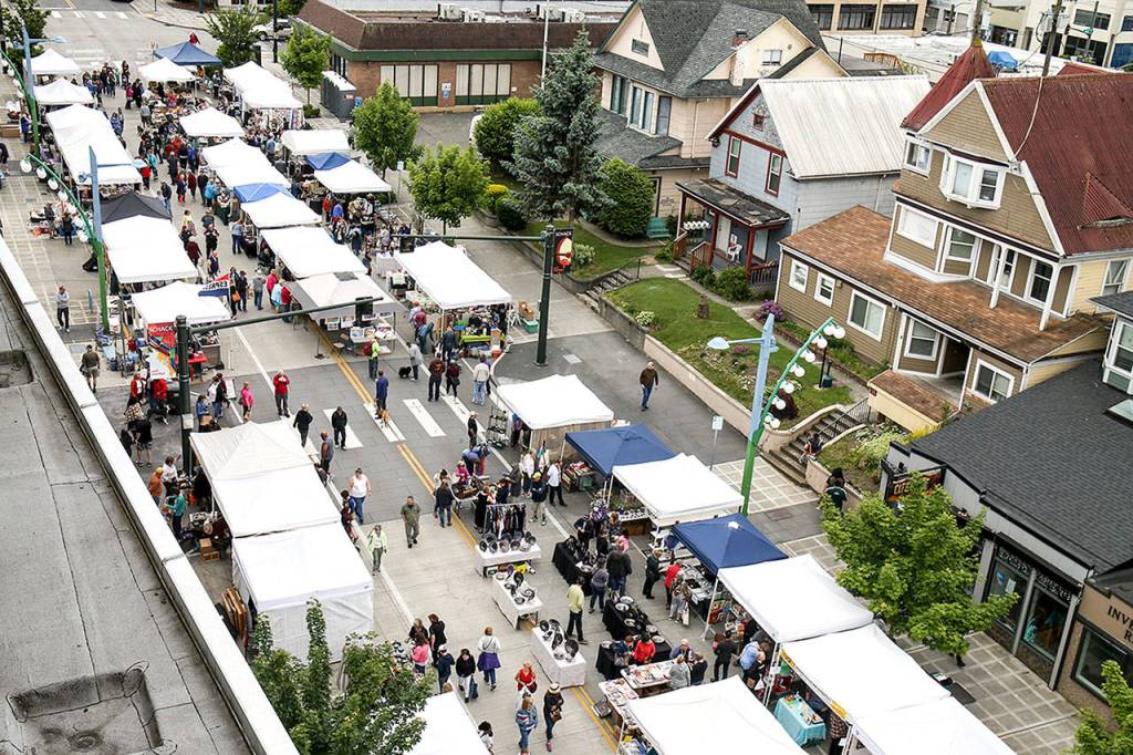 Up to 4,000 people attend the street art sale every year. (Kevin Clark / The Herald)