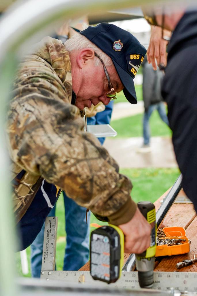 Photo courtesy of Jessamy Lennon photography                                Otis Wolfe, commander of the Gay Jones Veterans of Foreign Wars Post 921, helps build a picnic table at the Boys & Girls Club in Snohomish. He was participating in a Travis Manion Foundation project that connects veterans to their communities through service work.