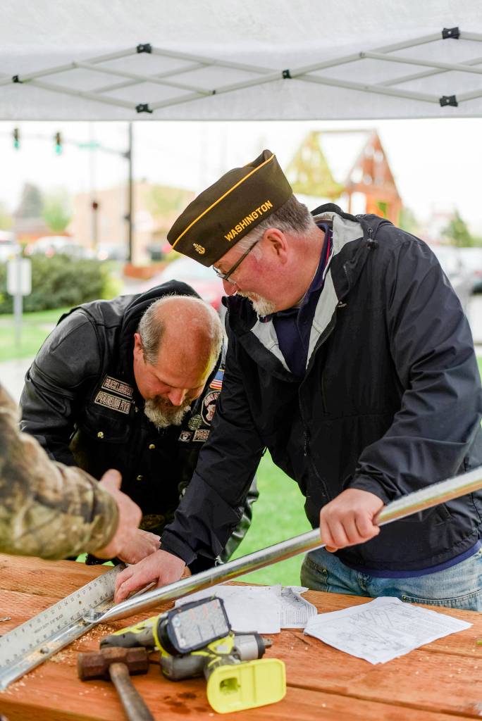 Photo courtesy of Jessamy Lennon photography                                Joe Warlaw and Eric English, members of the Gay Jones Veterans of Foreign Wars Post 921, help build picnic tables at the Snohomish Boys & Girls Club late last month. They were participating in a Travis Manion Foundation project that connects veterans to their communities through service work.