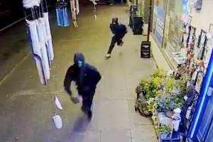 Video: Police seek masked robbers of Everett minimart