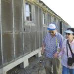 William and Shizue Watanabe walk outside one of the structures at the Minidoka National Historic Site during a visit in 2008. Both had family who were in the War Relocation Authoritys custody at the Minidoka Relocation Center during World War II. (Courtesy of Minidoka Pilgrimage)