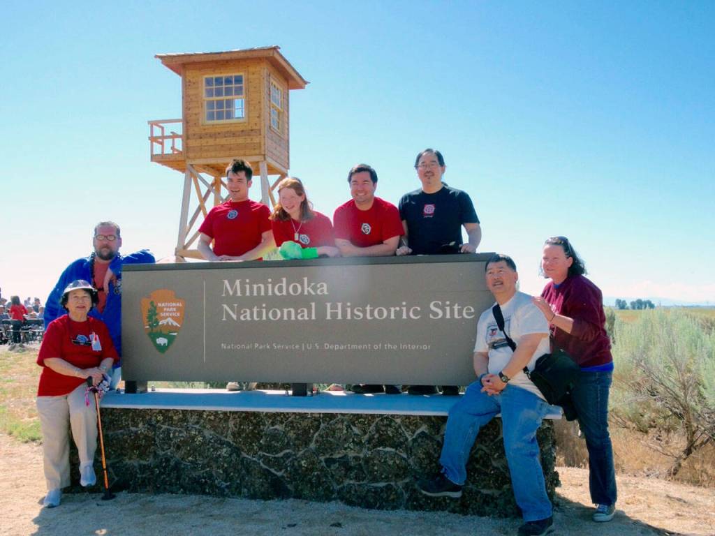 Members of the extended Watanabe family gather at the entrance to the Minidoka National Historic Site in southern Idaho. From left are Shizue Watanabe, Bif Brigman, Lucas Watanabe, Hannah Serl, Ben Watanabe, Dale Watanabe, Glen Watanabe, and Jody Serl. (Glen Watanabe)