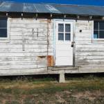 This shows the exterior of a building at Minidoka National Historic Site where thousands of people of Japanese ancestry were in custody of the War Relocation Authority during World War II in southern Idaho. After the war, many of the 600 buildings were allocated to veterans and the land was homesteaded. What remained was salvaged by locals for their farmhouses and barns. (Glen Watanabe)