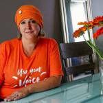 Judy Schneider-Wallace lost her first husband to suicide by gun. She is part of the Mukilteo/Lynnwood Moms Demand Action for Gun Sense in America group that will fly a large orange flag in Mukilteo through June 11, and who demonstrated Friday at an I-5 overpass and the Mukilteo Speedway in support of the Wear Orange movement to bring awareness to gun violence. (Dan Bates / The Herald)