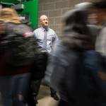 Principal Dave Peters holds the door for students at Henry M. Jackson High School in Mill Creek in January. (Kevin Clark / Herald file)