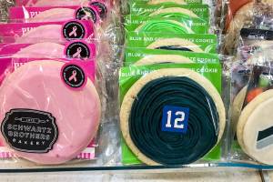 Seahawks and other frosted cookies by Schwartz Brothers Bakery​ are among the many Washington products sold on the ferries.​ (Andrea Brown / The Herald)