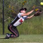 Marysville Pilchucks Chloe Morgan dives for the catch during a game against Snohomish on May 15, 2018, at Phil Johnson Ballfields in Everett. (Andy Bronson / The Herald)