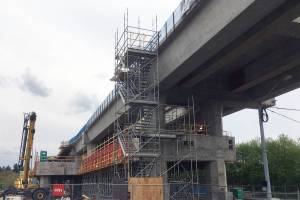 Light rail loses some bells and whistles as it inches north