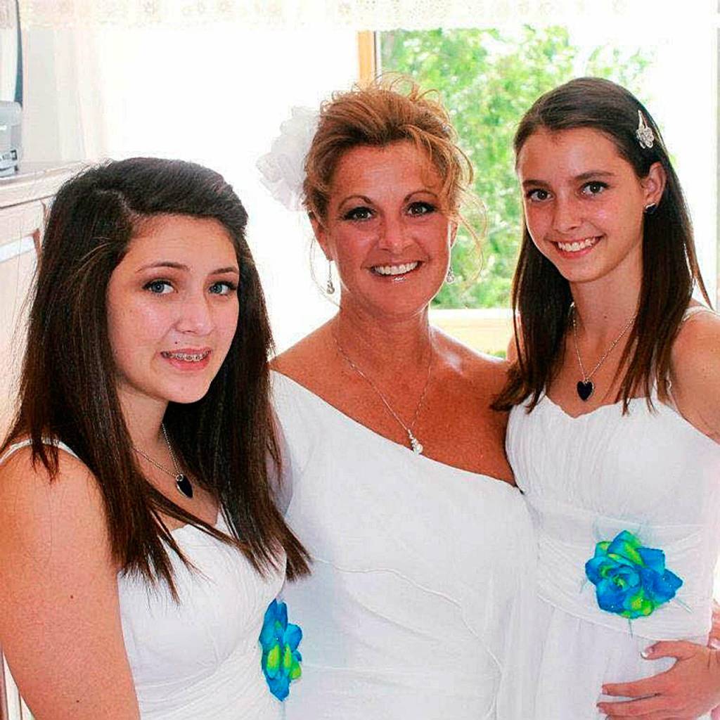 From left: Zoe Galasso, Cheyenne Coes mom, Ginny Schlegel, and Cheyenne Coe in 2012. Cheyenne was her moms maid of honor in a backyard wedding, and Zoe was the flower girl. (Courtesy of Cheyenne Coe)