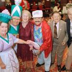 In this 1997 photo, cast members from The Wizard of Oz (from left), Margaret Pellegrini, Clarence Swensen, Ruth Duccini, Jerry Maren, Karl Slover and Mickey Carroll, appear at the Culver Hotel in Culver City, California, where they stayed during the filming of the movie. Maren, the last surviving munchkin from the classic 1939 film The Wizard of Oz, died on May 24, 2018, at a San Diego nursing home. He was 98. (AP Photo/Mark J. Terrill, File)