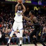 Golden States Kevin Durant shoots over Clevelands Jeff Green during the Warriors 110-102 victory over the Cavaliers in Game 3 of the NBA Finals on Wednesday in Cleveland. Durant scored a playoff career-high 43 points in the win. (AP Photo/Tony Dejak)