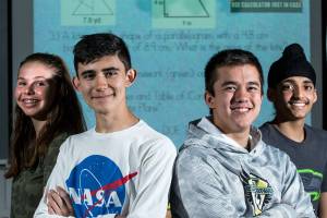 Katelyn Pryor, Diego Corpening, Dylan Austin and Prabhman Aujla take high school level credit classes while attending Eisenhower Middle School in Everett. (Andy Bronson / The Herald)                                Andy Bronson / The Herald                                Katelyn Pryor, Diego Corpening, Dylan Austin and Prabhman Aujla take high school level credit classes while attending Eisenhower Middle School in Everett.