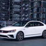 A new GT variant of the 2018 Volkswagen Passat includes GTI-inspired exterior touches such as a front red accent line and red brake calipers. (Manufacturer photo)
