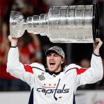 Washingtons T.J. Oshie, a Snohomish County native, hoists the Stanley Cup after the Capitals defeated Vegas 4-3 in Thursdays Game 5 to win the Stanley Cup Finals. (AP Photo/John Locher)