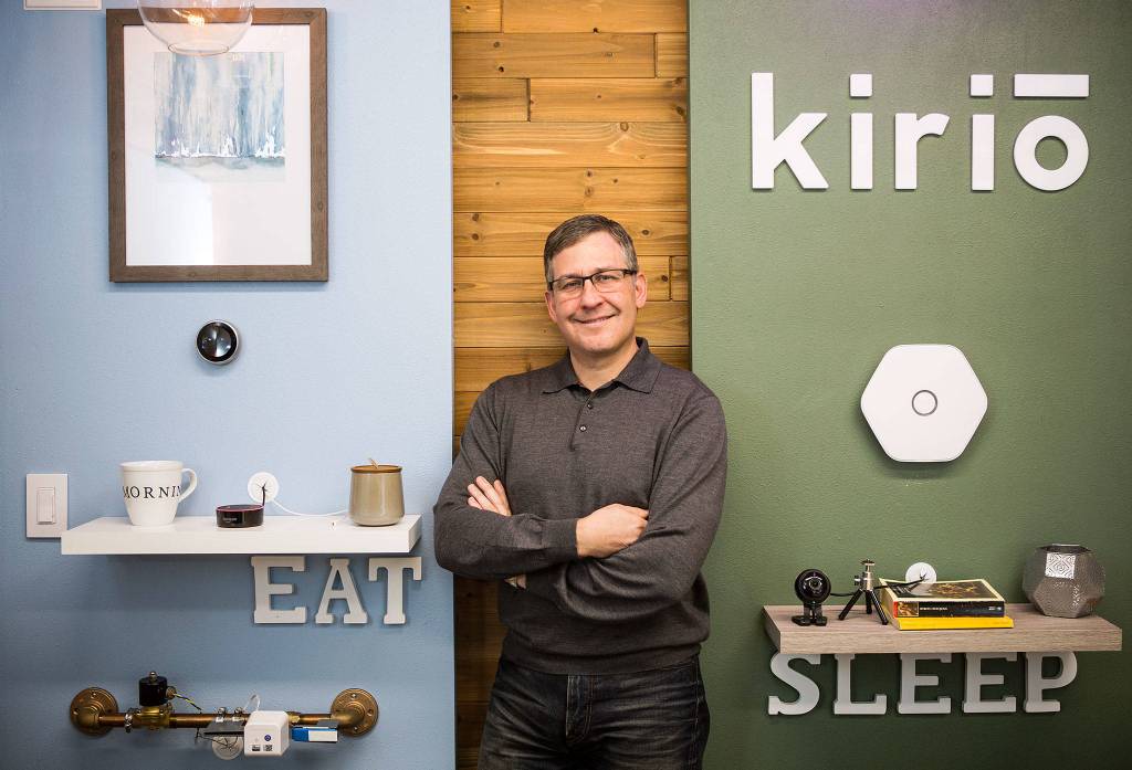 Kirio Inc. CEO Rob Green stands with the Smart Hub and objects that it can control, in an office in the the companys showroom, on March 20, 2018 in Lynnwood. (Andy Bronson / The Herald)