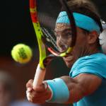 Spains Rafael Nadal plays a shot against Austrias Dominic Thiem in the mens final match of the French Open tennis tournament at the Roland Garros stadium in Paris, France, Sunday, June 10, 2018. (AP Photo/Alessandra Tarantino)