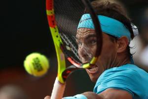 Nadal wins 11th French Open title by beating Thiem in 3 sets
