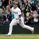 The Mariners Mitch Haniger celebrates as he runs the bases after hitting a two-run walk-off home run against the Angels in the ninth inning of a game June 13, 2018, in Seattle. The Mariners won 8-6. (AP Photo/Ted S. Warren)