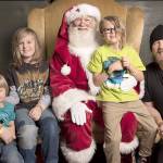 The Drake family poses with Santa in 2017. From left are Jenny, Dylan, Braeden, Zachary and Jerry Drake. (provided by family)