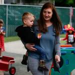 When in the playground area at Tomorrows Hope Child Development Center in Everett, director Erin Jackson can be seen, more often than not, with a child on her hip. (Dan Bates / The Herald)