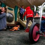 Director Erin Jackson holds a child (left) at Tomorrows Hope Child Development Center in Everett. (Dan Bates / The Herald)