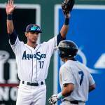 The AquaSoxs Nick Rodriguez (left) signals with the Hops Jose Caballero safe at second during a game on June 15, 2018, at Everett Memorial Stadium. (Kevin Clark / The Herald)