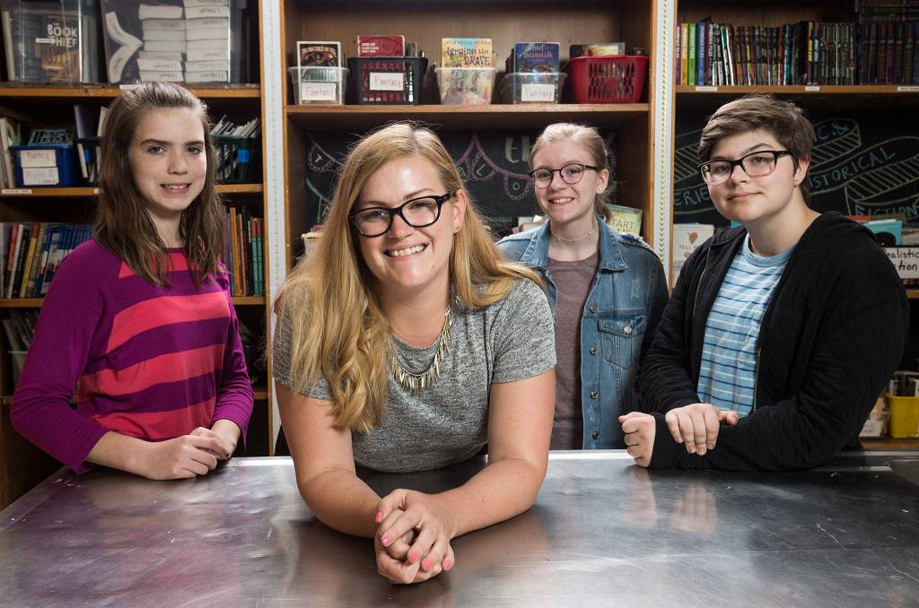 Kolleen Lothian, 31, 7th grade teacher at Totem Middle School did a project with students called Genius Hour where they develop a research and action project to raise money for causes. Here she is with students Mckinley Galde, Sidney Sumsion and Molly Wight on June 12 in Marysville. Read the story <a href="https://www.heraldnet.com/news/googles-genius-hour-inspired-marysville-students-to-raise-3k/" target="_blank">here</a>. (Andy Bronson / The Herald)