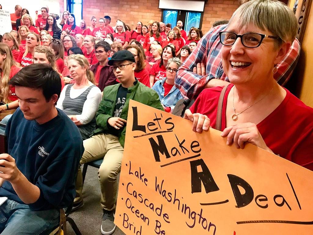 Teachers in the Mukilteo School District jammed a school board meeting on June 11, urging elected officials to renegotiate salaries. (Andrea Brown / The Herald)