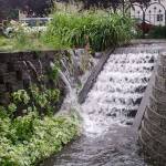 Rain water and sewage cascade down the steps at Tia Scott and Tyler Dentons home. (Courtesy photo)
