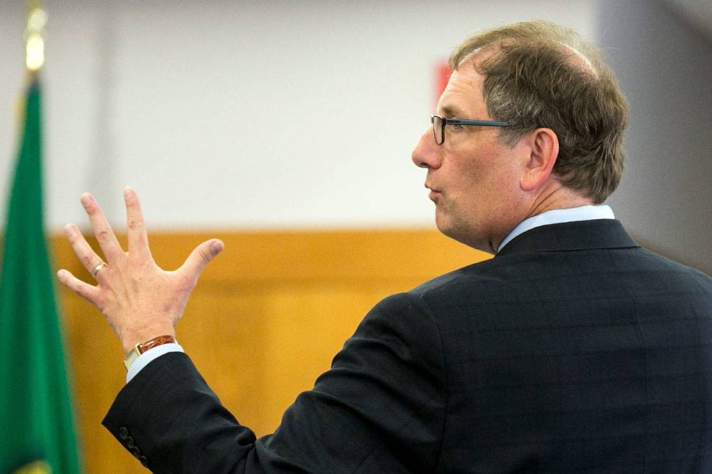 Snohomish County deputy prosecutor Tobin Darrow makes his opening statements in the trial of Todd Brown on Tuesday morning at the Snohomish County Courthouse in Everett. Brown is accused of vehicular homicide in the deaths of two children. (Kevin Clark / The Herald)