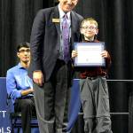 Everett schools Superintendent Gary Cohn presents Evergreen Middle School student Teddy Jackson with the Superintendents Award: Exemplifying 21st Century Skills. (Contributed photo)