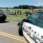 This small airplane overshot the runway at Harvey Field in Snohomish and came up against a car on Airport Way. (Snohomish Police Department)