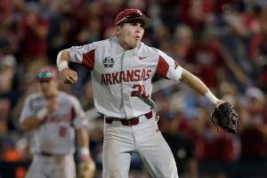 Arkansas tops Oregon St. in CWS championship opener