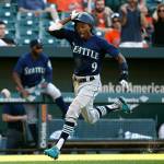 The Mariners Dee Gordon scores a run on a single by Jean Segura in the 10th inning against the Orioles on June 28, 2018, in Baltimore. Seattle won 4-2 in 10 innings. (AP Photo/Patrick Semansky)