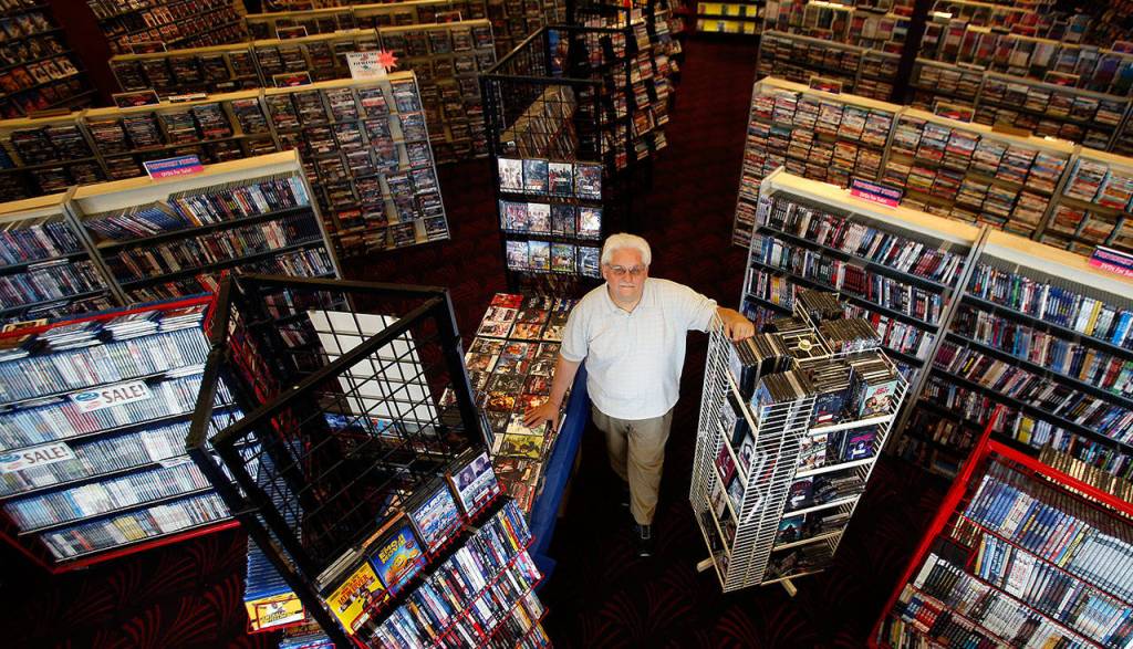 Perry Irvine, 67, opened Silver Lake Video in 1985 with VHS and Beta tapes. The store has 15,000 DVDS and Blu-rays, popcorn, free kids rentals and two bubblegum machines. (Dan Bates / The Herald)