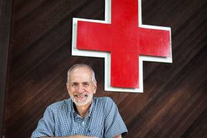 Chuck Morrison outside the Snohomish Country Red Cross building in Everett. He is retiring after working for the Red Cross for more than 14 years. (Olivia Vanni / The Herald)