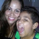 This undated photo provided by Lidia Karine Souza via her attorney Lidia posing for a photo with her son Diogo De Olivera Filho. The mother from Governador Valadares, Brazil has filed a federal lawsuit demanding the release of her 9-year-old son whos being detained in Chicago after the two were separated at the border. (Courtesy of Lidia Karine Souza via AP)