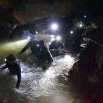 Thai rescue teams walk inside cave complex where 12 boys and their soccer coach went missing, in Mae Sai, Chiang Rai province, in northern Thailand on Mon, July 2, 2018. Rescue divers are advancing in the main passageway inside the flooded cave in northern Thailand where the boys and their coach have been missing more than a week. (Tham Luang Rescue Operation Center via AP)