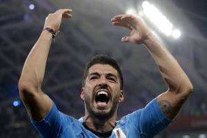 After the hand and the bite, Suarez gets his head right