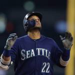 The Mariners Robinson Cano looks skyward as he crosses home plate after hitting a three-run home run during the fifth inning against the Tigers on May 12, 2018, in Detroit. (AP Photo/Carlos Osorio)