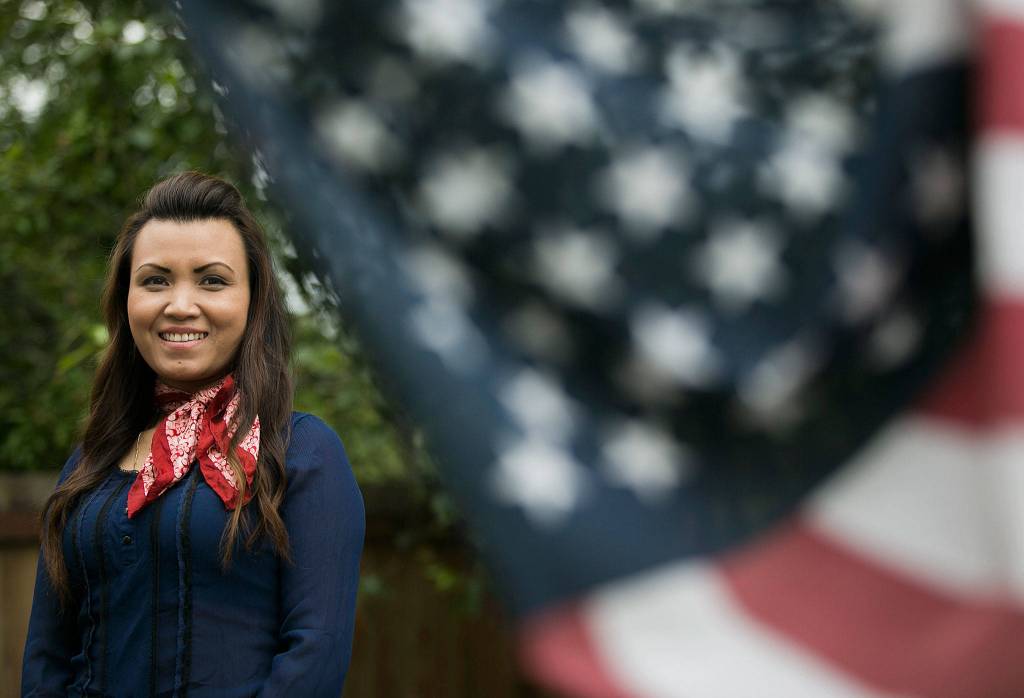 HBion Buonto will be one of about 500 people participating in the U.S. Naturalization Ceremony at the Seattle Center on July 4, after recently passing the citizenship test. She is pictured outside her home in Marysville on June 28. Read her remarkable story <a href="https://www.heraldnet.com/news/she-is-becoming-an-american-citizen-on-independence-day/" target="_blank">here</a>. (Olivia Vanni / The Herald)