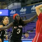 Washingtons Agwin Atem (center) defends against Texas Liane Matzenbach and Washingtons Melany Hernandez (left) during the 2018 Special Olympics USA Games Basketball at Alaska Airlines Arena at Hec Edmundson Pavilion in Seattle on July 5. Read their Silver Medal story <a href="https://www.heraldnet.com/sports/washington-earns-female-hoops-silver-medal-at-special-olympics/" target="_blank">here</a>. (Kevin Clark / The Herald)
