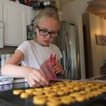 Zoe Bennett, 10, cuts out heart-shaped dog treats in her kitchen on June 28 in Marysville. Read about how she sells them to raise money for her best friends cancer treatments <a href="https://www.heraldnet.com/news/when-phenyx-was-diagnosed-with-cancer-zoe-didnt-hesitate/" target="_blank">here</a>. (Olivia Vanni / The Herald)