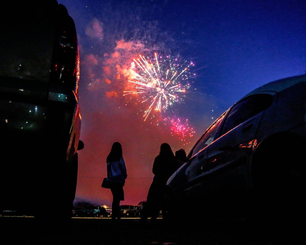 During a memorial fireworks display July 3 at Boom City, a number of people watched from their vehicles in the adjacent parking lot. Story and video <a href="https://www.heraldnet.com/news/its-blast-when-everyone-gathers-at-boom-city/" target="_blank">here</a>. (Dan Bates / The Herald)