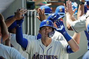 Healy drives in five runs as Mariners beat the Rockies 6-4