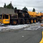 A crane truck caught fire Monday morning on Highway 526 near I-5 and the exit to Evergreen Way in Everett. (Everett Police Department)