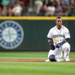 Jean Segura of the Seattle Mariners kneels on second base during a pitching change in Thursdays game against the Los Angeles Angels at Safeco Field in Seattle. (AP Photo/Stephen Brashear)