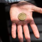 Eric Brossard displays his commemorative drug court graduation coin that reads, I came with hope, worked and learned. I have a new life. A life that Ive earned. (Olivia Vanni / The Herald)