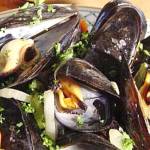 Serve Moules a la Normande (Mussels in cream sauce) for Bastille Day on July 14. (Linda Gassenheimer/TNS)